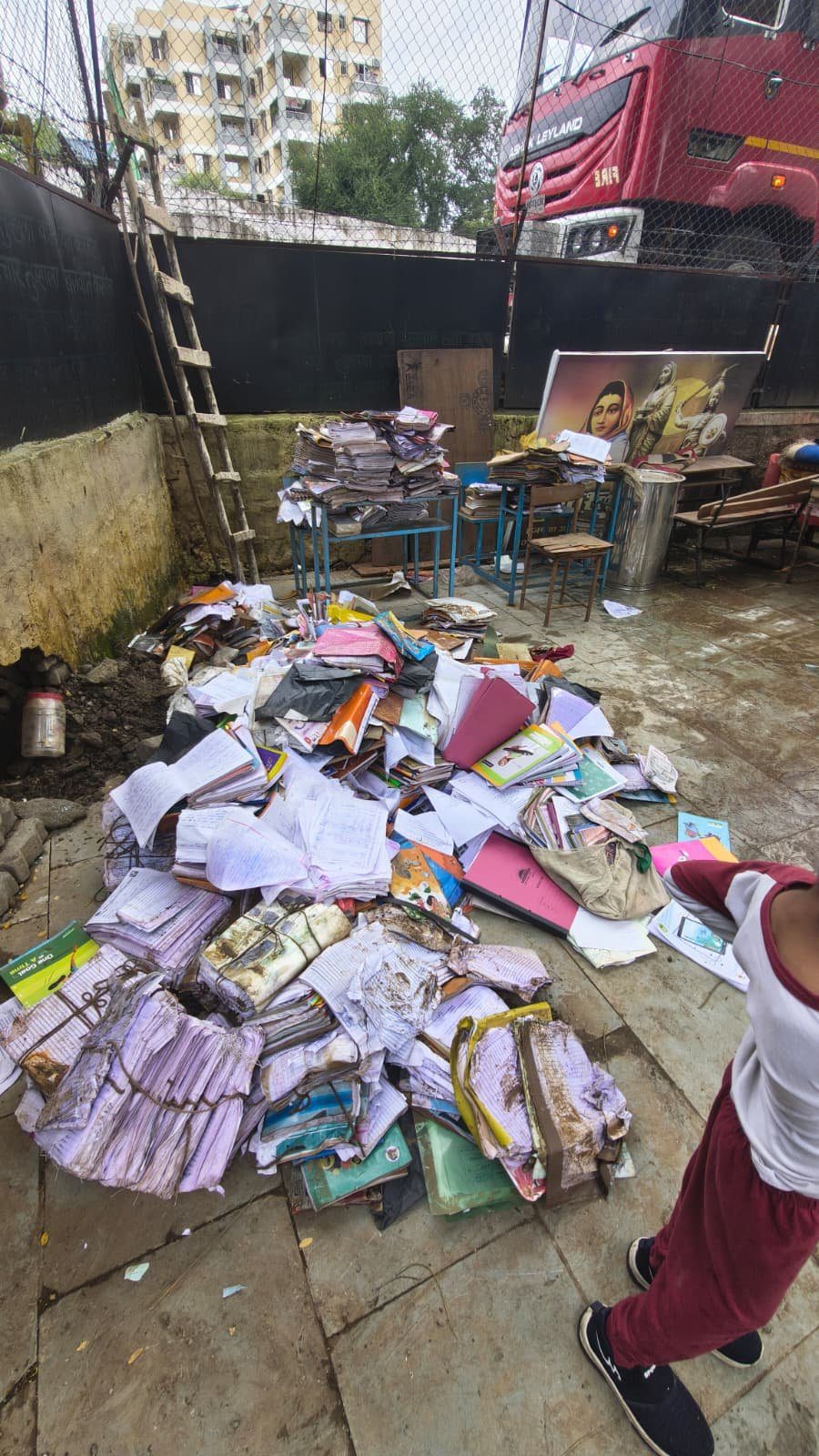 Books and notebooks from the classrooms, ruined by the floodwater